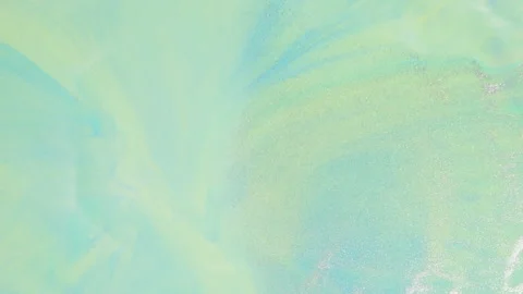 Abstract mint green fluid motion with soft liquid swirls and bubbles Stock Footage 331687256