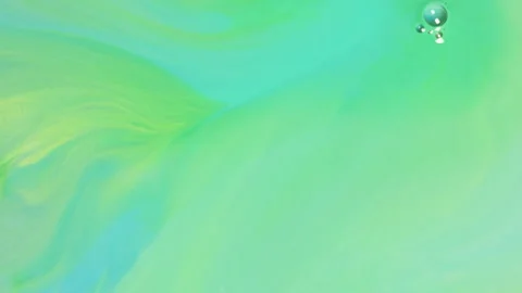 Abstract mint green fluid motion with soft liquid swirls and bubbles 스톡 동영상 331687568