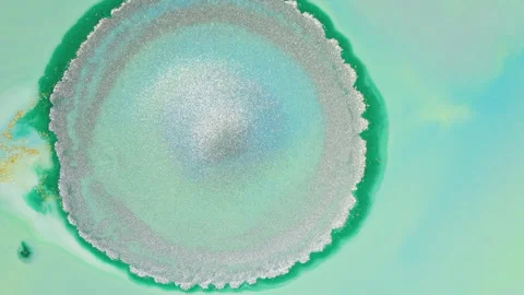 Abstract mint green fluid motion with soft liquid swirls and bubbles Stock Footage 331687647