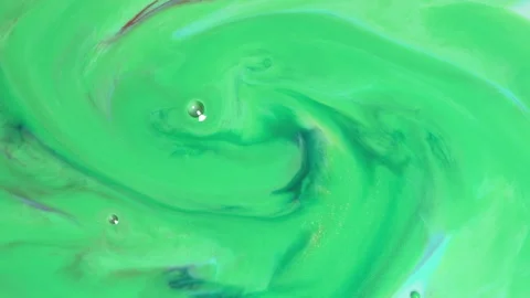 Abstract mint green fluid motion with soft liquid swirls and bubbles Stock Footage 331690135