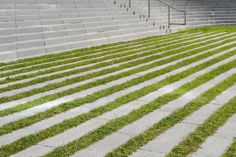 Abstract modern architecture concept, alternating concrete and green grass Foto stock