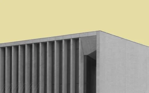 Abstract modern building facade with vertical fins and clean geometric lines. Stock Photos