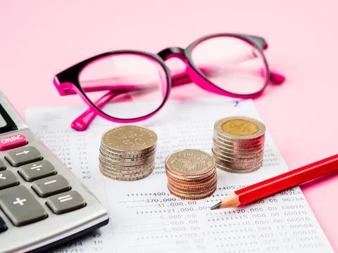 Abstract money saving. financial statement with stack of coins, calculator, g Foto stock