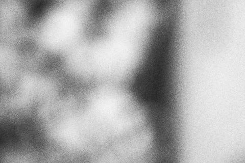Abstract monochrome light and shadow texture with soft grain background Stock Photos