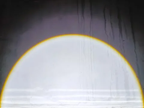 Abstract Moonlight Effect from Battery Light Reflection on Wall Stock Photos