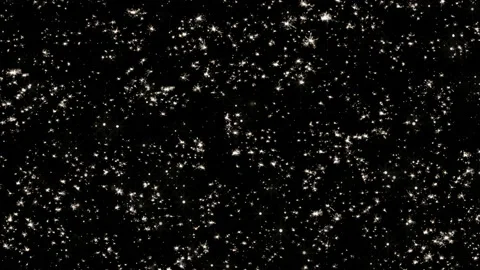 Abstract motion background of shining and sparkling particles. Sparks of Bengal Stock Footage 141294528