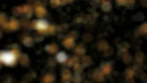 Abstract motion background shining gold blur particles background 4K loop Stock Footage 144341411