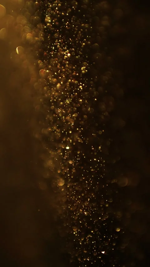 Abstract motion background shining gold particles. Glittering Particles With Stock Footage 275338603