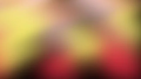 Abstract motion background with soft, blurry spots of warm red and yellow light. Stock Footage 317809164