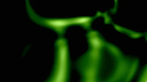 Abstract motion graphic of flowing green fluid particles on the dark background. Stock Footage 201336643