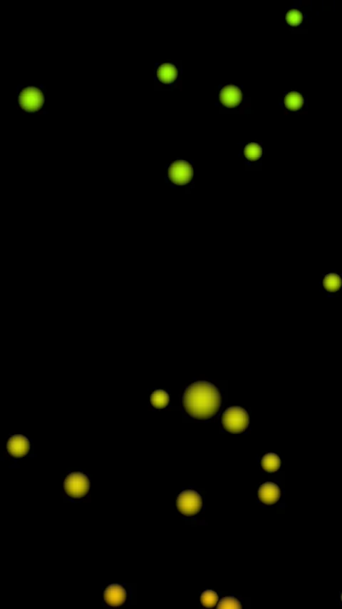 Abstract motion graphics featuring glowing green and yellow spheres falling.. Stock Footage 338210463