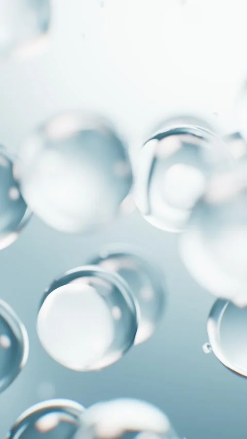 Abstract motion of transparent water bubbles floating in slow motion on lig.. Stock Footage 327345137