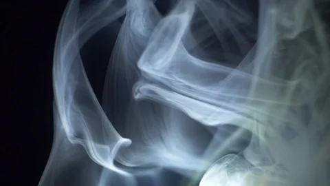 Abstract motion of white smoke in light on a black background Video stock 105238259