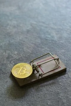 Abstract mouse trap with cryptocurrency Bitcoin Stock Photos