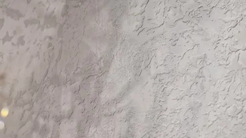 Abstract Moving Shadows on Textured Gray Wall. Stock Footage 341326257