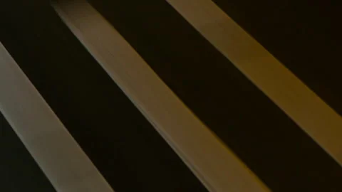 Abstract moving sunlight on diagonal escalator steps Vídeos de archivo 334787335