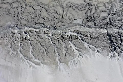 Abstract mud cracks and patterns aerial view Stock Photos