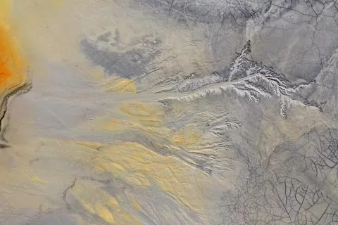 Abstract mud cracks and patterns aerial view Stock Photos