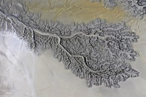 Abstract mud cracks and patterns aerial view Stock Photos