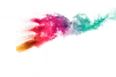 Abstract multi color powder explosion on white background.Freeze motion of .. Illustrazione stock