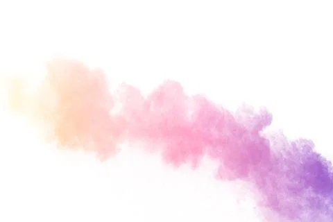 Abstract multi color powder explosion on white background.Freeze motion of .. Stock Illustration