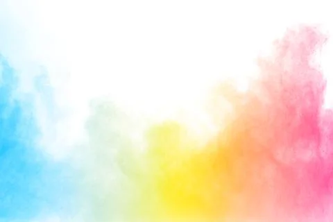 Abstract multi color powder explosion on white background. Stock Photos