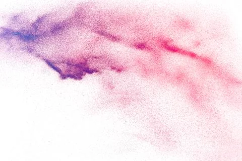 Abstract multi color powder explosion on white background. Stock Photos
