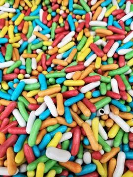 Abstract multi-colored candy background, oblong candy blue, red, yellow, gree Stock Photos