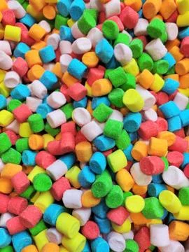 Abstract multi-colored marshmallow background, red yellow blue green sweet so Stock Photos