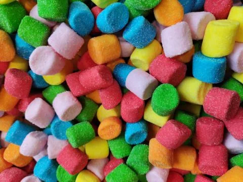 Abstract multi-colored marshmallow background, red yellow blue green sweet so Stock Photos