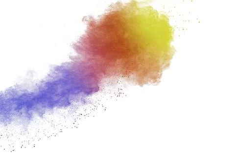 Abstract multi colored powder explosion on white background. Stock Photos