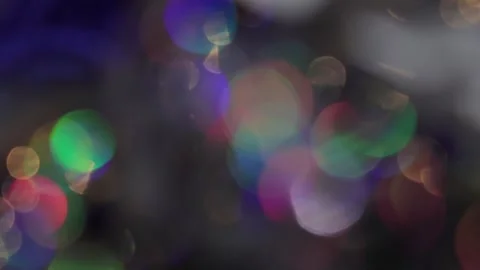 Abstract multicolor bokeh light leaks with fast motion studio footage of light l Vidéo 317536319