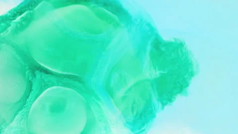 Abstract multicolor fluid diffusion with organic ink swirls and liquid textures Stock Footage 331672139