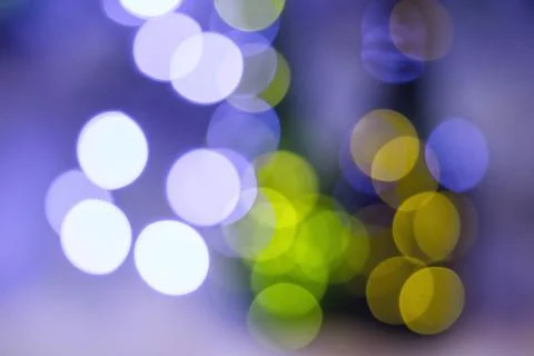 Abstract multicolored bokeh on a dark background Stock Photos