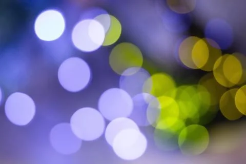 Abstract multicolored bokeh on a dark background Stock Photos