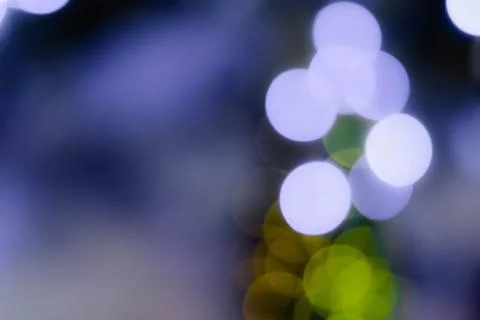 Abstract multicolored bokeh on a dark background Stock Photos