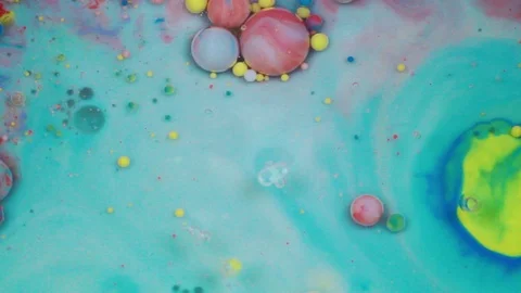Abstract multicolored bubbles paint. Slow motion. Top view Stock Footage 105174927