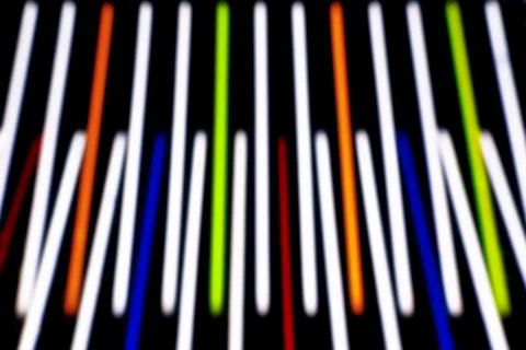 Abstract multicolored glowing abstract stripes on isolated black background.. Stock Photos