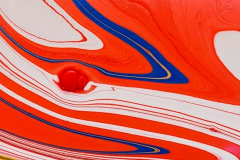 Abstract multicolored liquid solution surface macro close up from above Stock Photos