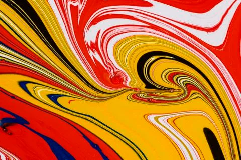 Abstract multicolored liquid solution surface macro close up from above Stock Photos