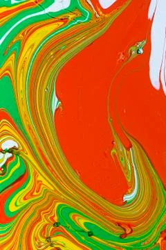 Abstract multicolored liquid solution surface macro close up from above Stock Photos