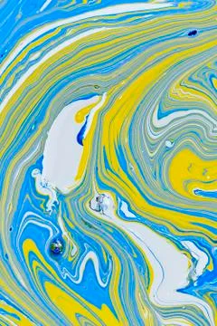 Abstract multicolored liquid solution surface macro close up from above Stock Photos