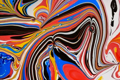 Abstract multicolored liquid solution surface macro close up from above Stock Photos