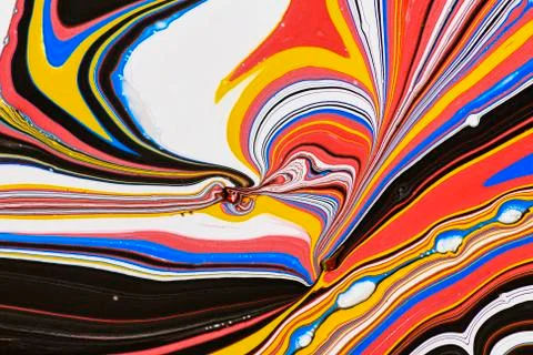 Abstract multicolored liquid solution surface macro close up from above Stock Photos
