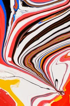 Abstract multicolored liquid solution surface macro close up from above Stock Photos
