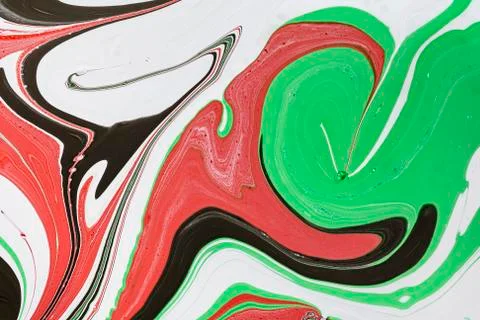 Abstract multicolored liquid solution surface macro close up from above Stock Photos