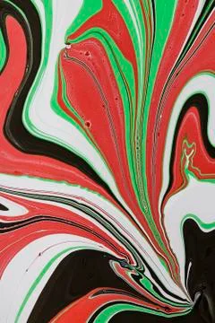 Abstract multicolored liquid solution surface macro close up from above Stock Photos