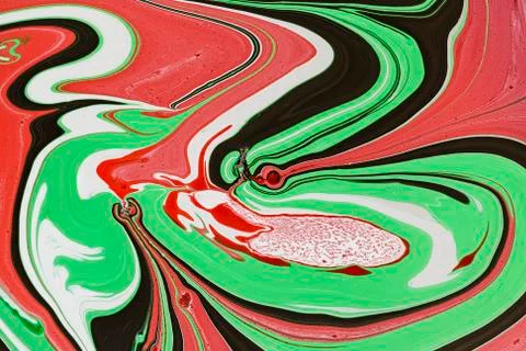 Abstract multicolored liquid solution surface macro close up from above Stock Photos