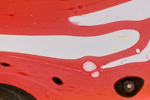 Abstract multicolored liquid solution surface macro close up from above Stock Photos