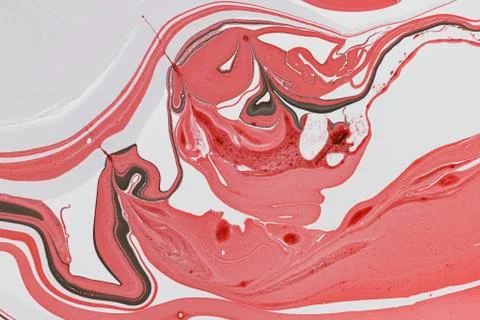 Abstract multicolored liquid solution surface macro close up from above Stock Photos